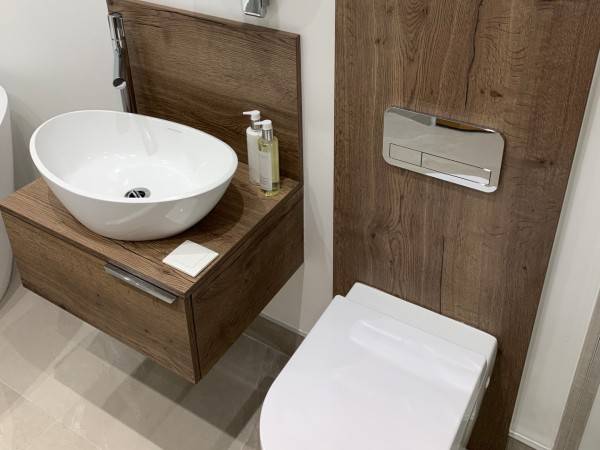 professional-tiler-working-on-wall-tiling